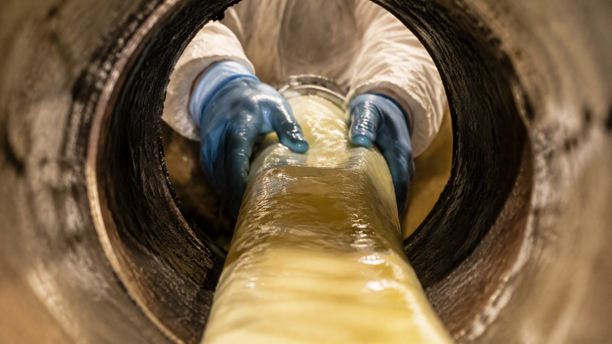 Sewer line replacement with new PVC pipe during a Greensboro sewer repair project